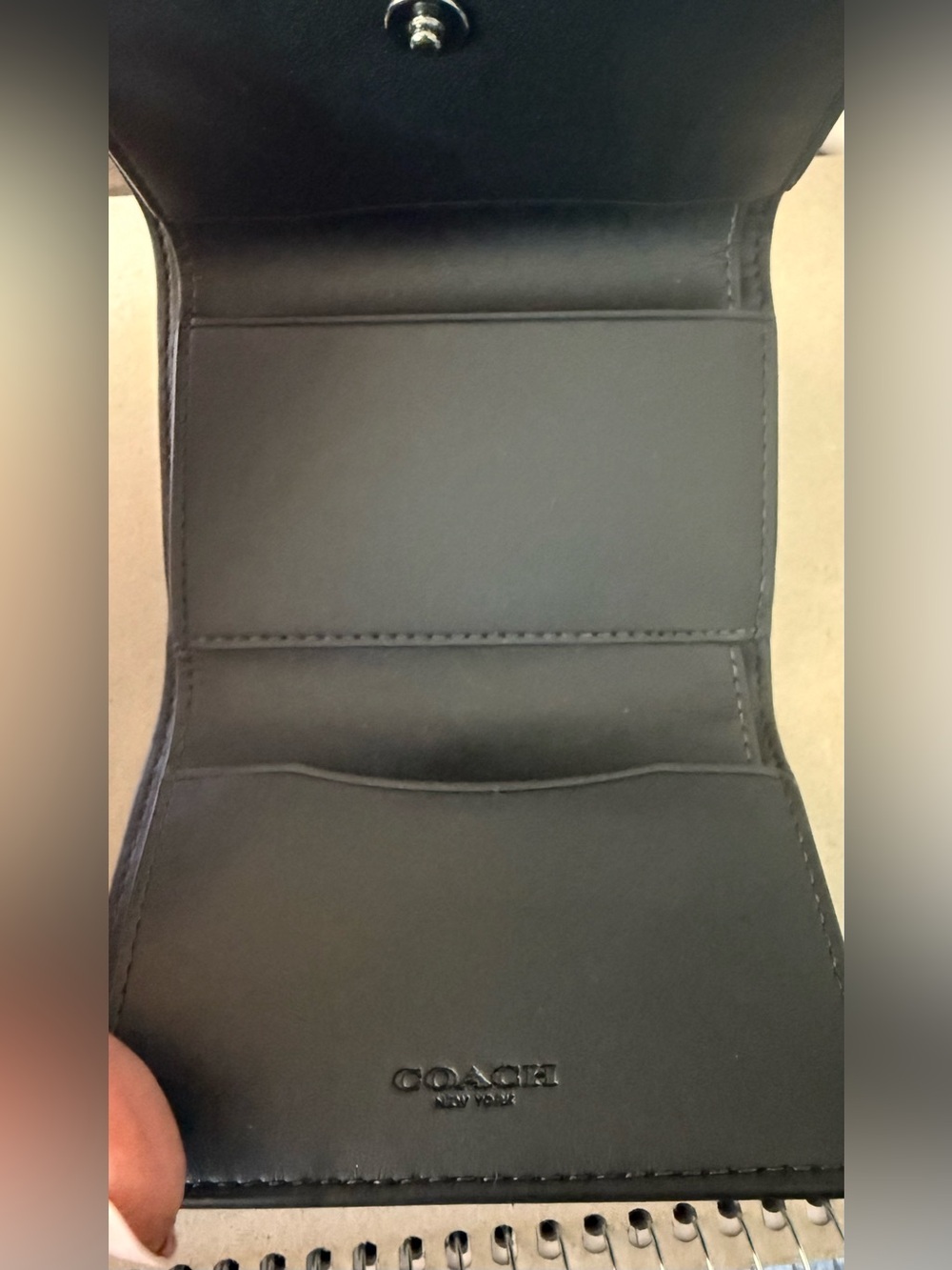 COACH Black Leather Tri-Fold Wallet with Embossed Coach Logo - Picture 3 of 5